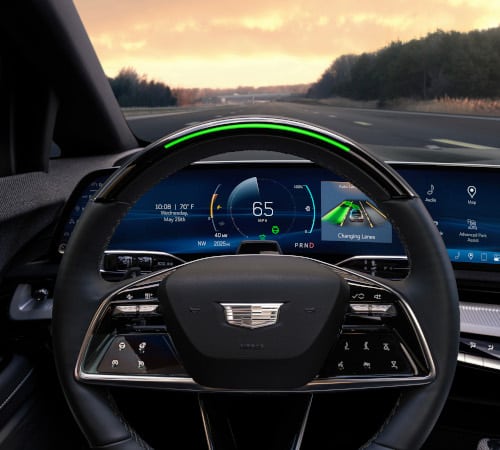 Car dashboard with digital speedometer displaying 65 mph, navigation, and touch controls.