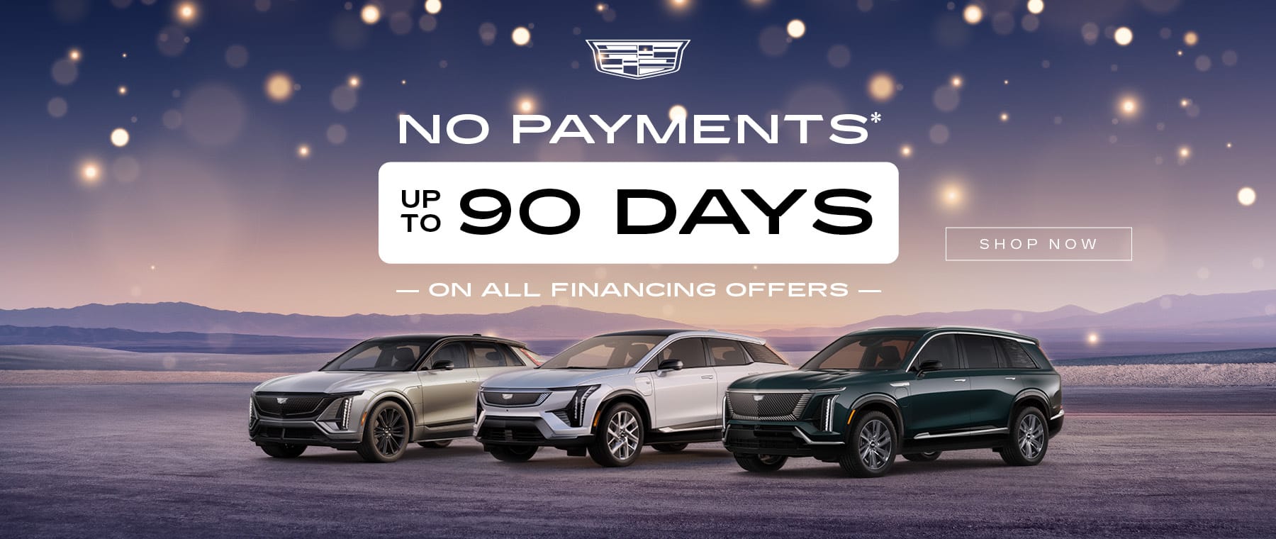 Cadillac financing offer: No payments for up to 90 days on all models, with three cars on a scenic desert backdrop.