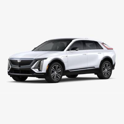 White luxury SUV with sleek design, showcasing modern black accents and distinctive front headlights.